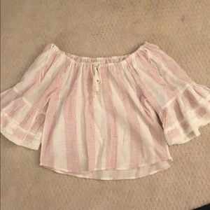 White off the shoulder top with red stitching